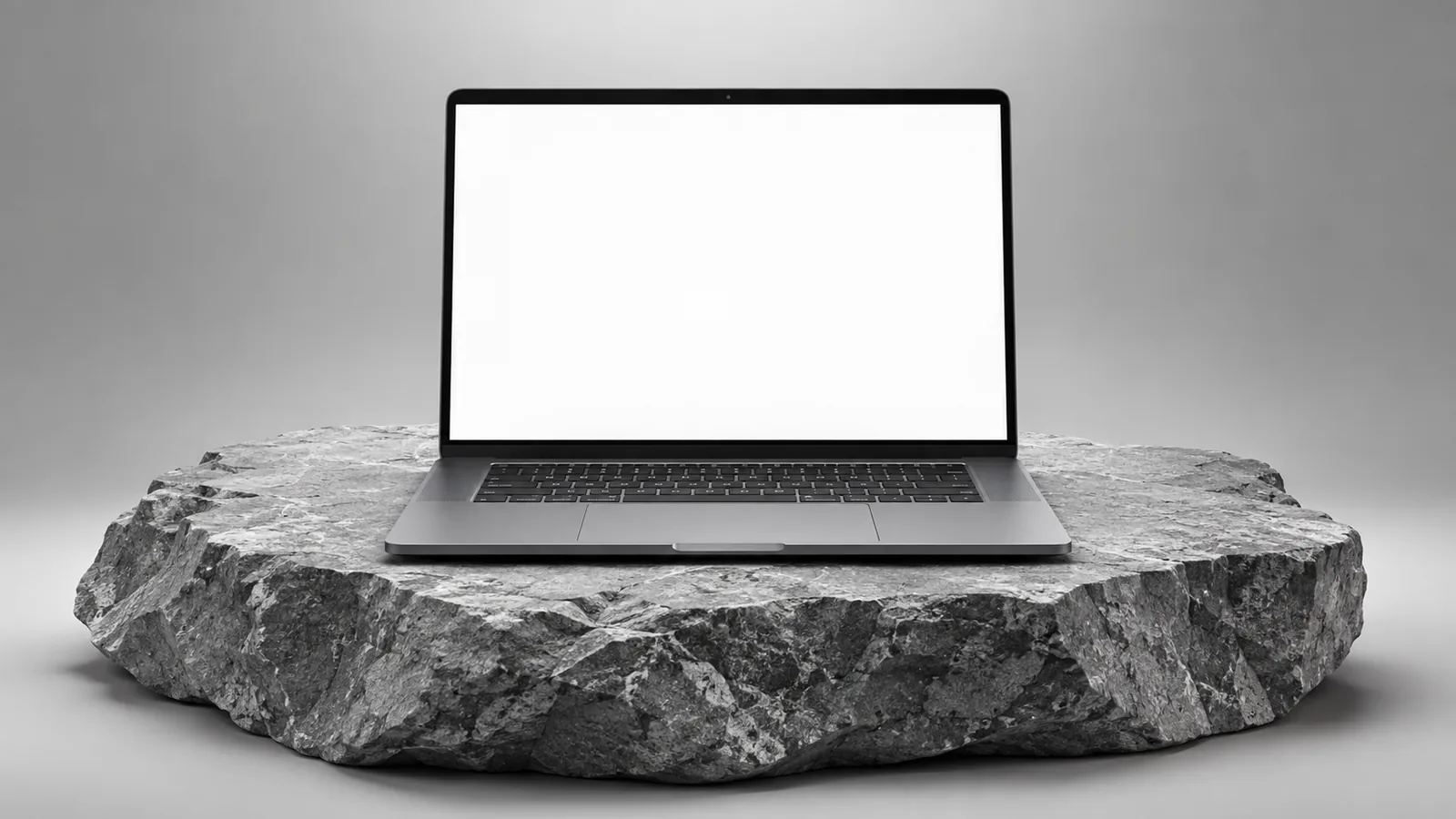 Notebook sobre uma pedra bruta mostrando a página de um salão